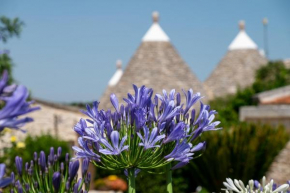 Trulli Oasi Fiorita - Exclusive Apulian Holidays Castellana Grotte